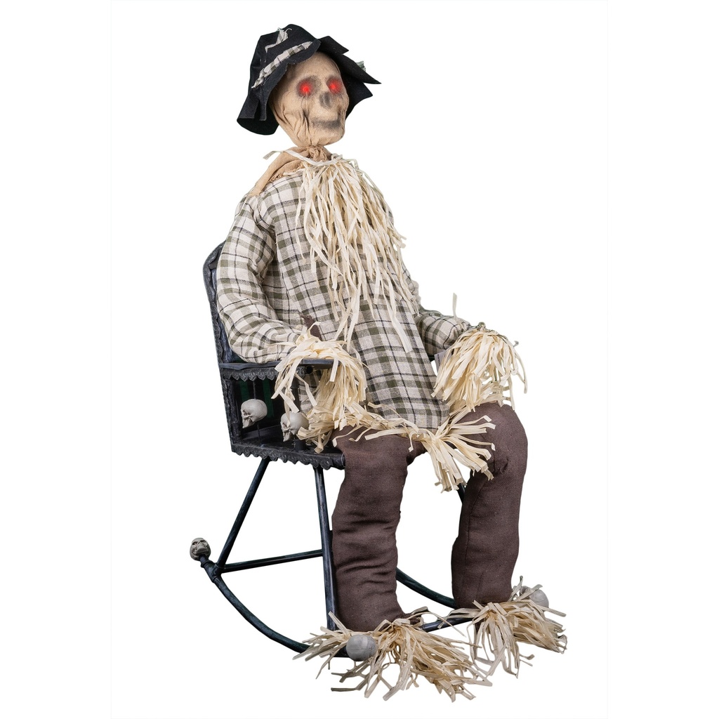 Vogelverschrikker op schommelstoel